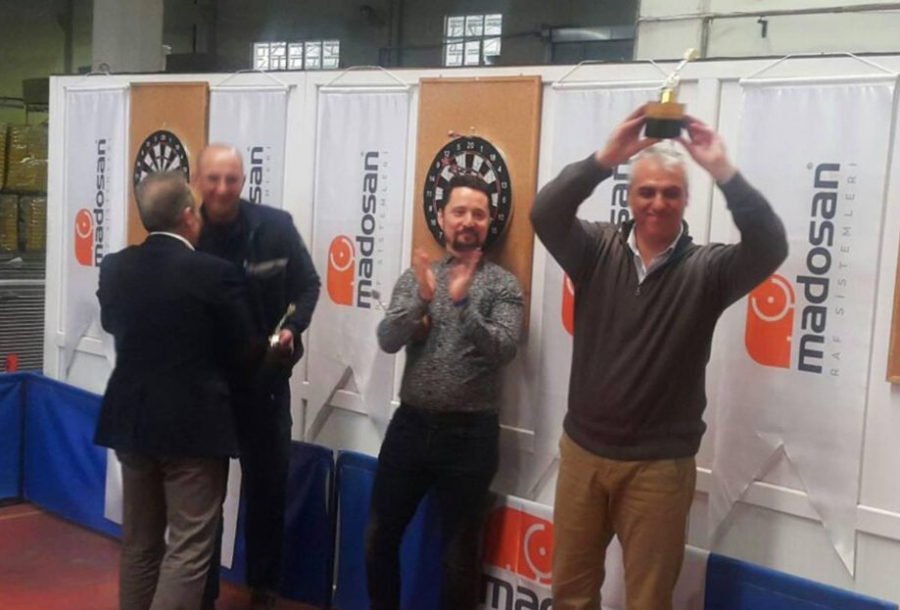 Madosan's Dart Tournament winners celebrating their victory